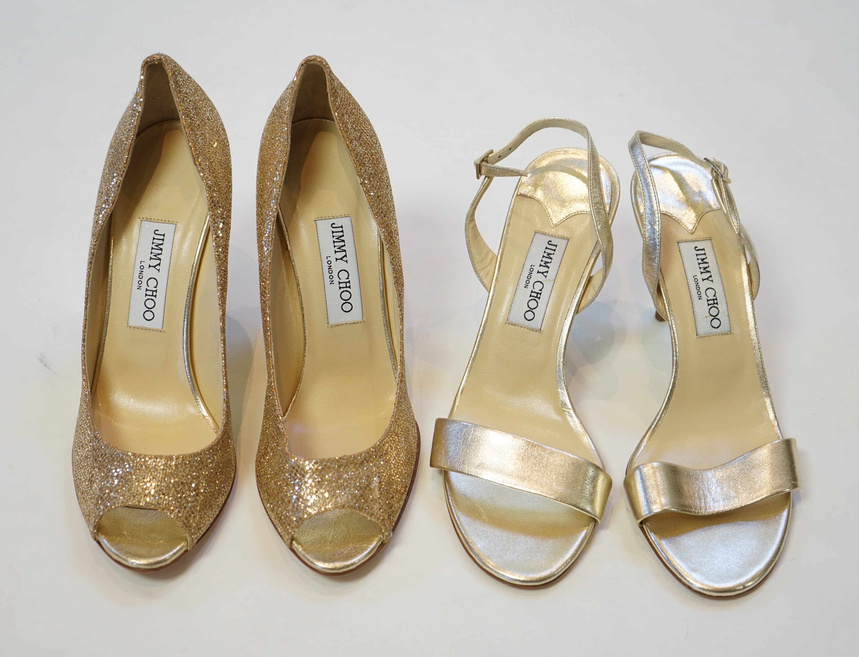 Two pairs of Jimmy Choo gold lady's heeled shoes, size EU 39